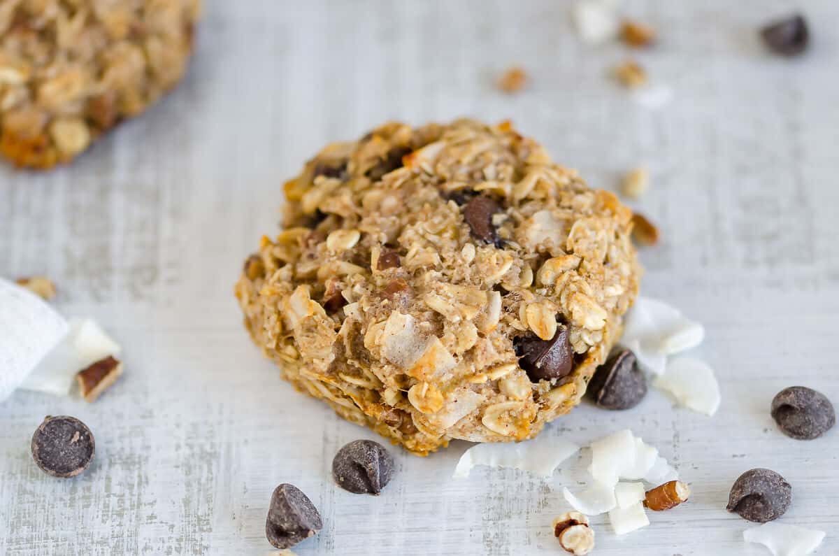 healthy breakfast cookie with chocolate chips and coconut chips surrounding the cookie