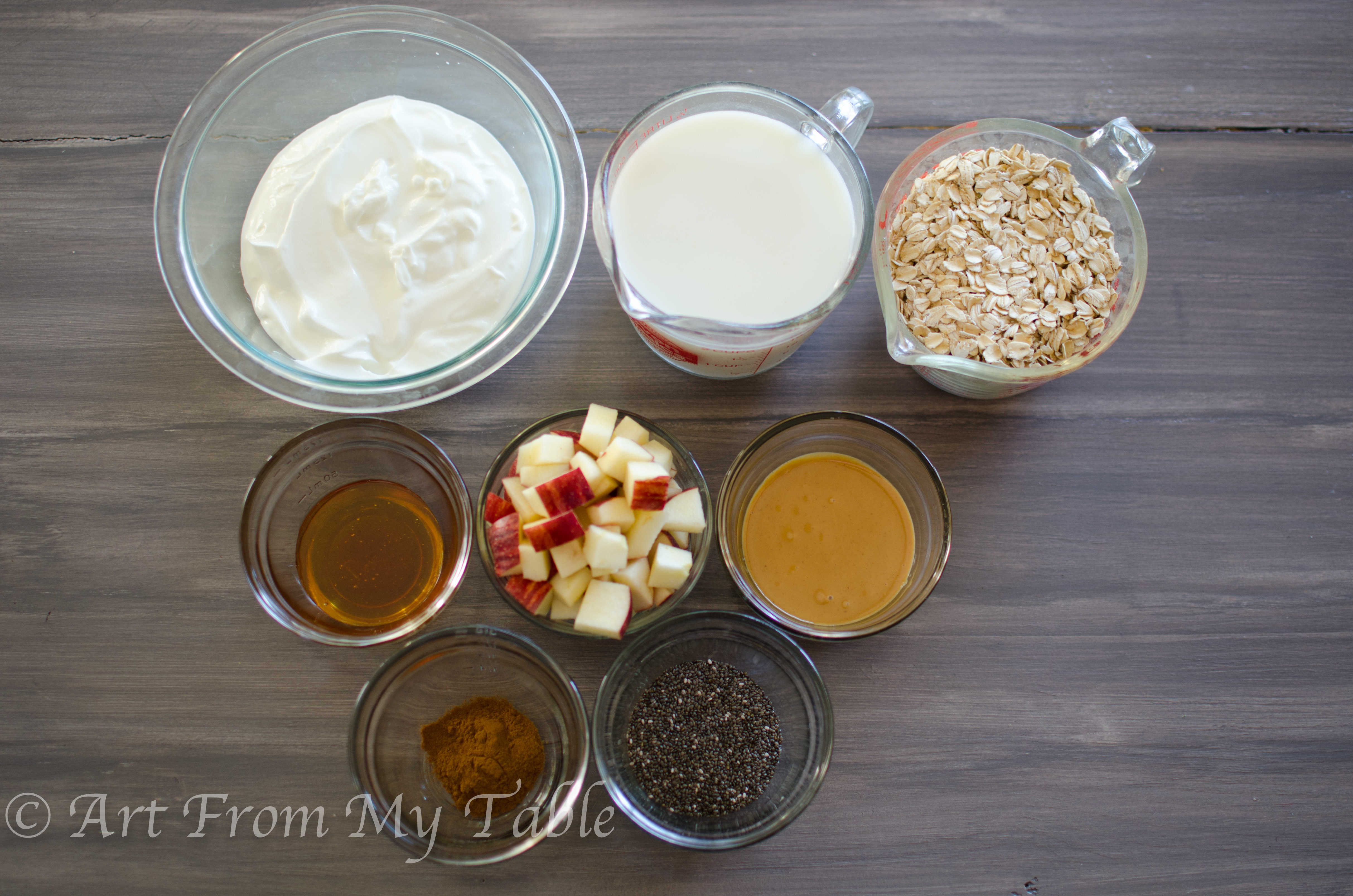 Ingredients for Overnight oats: Yogurt, milk, oats, honey, peanut butter, chia seeds, apples, cinnamon.