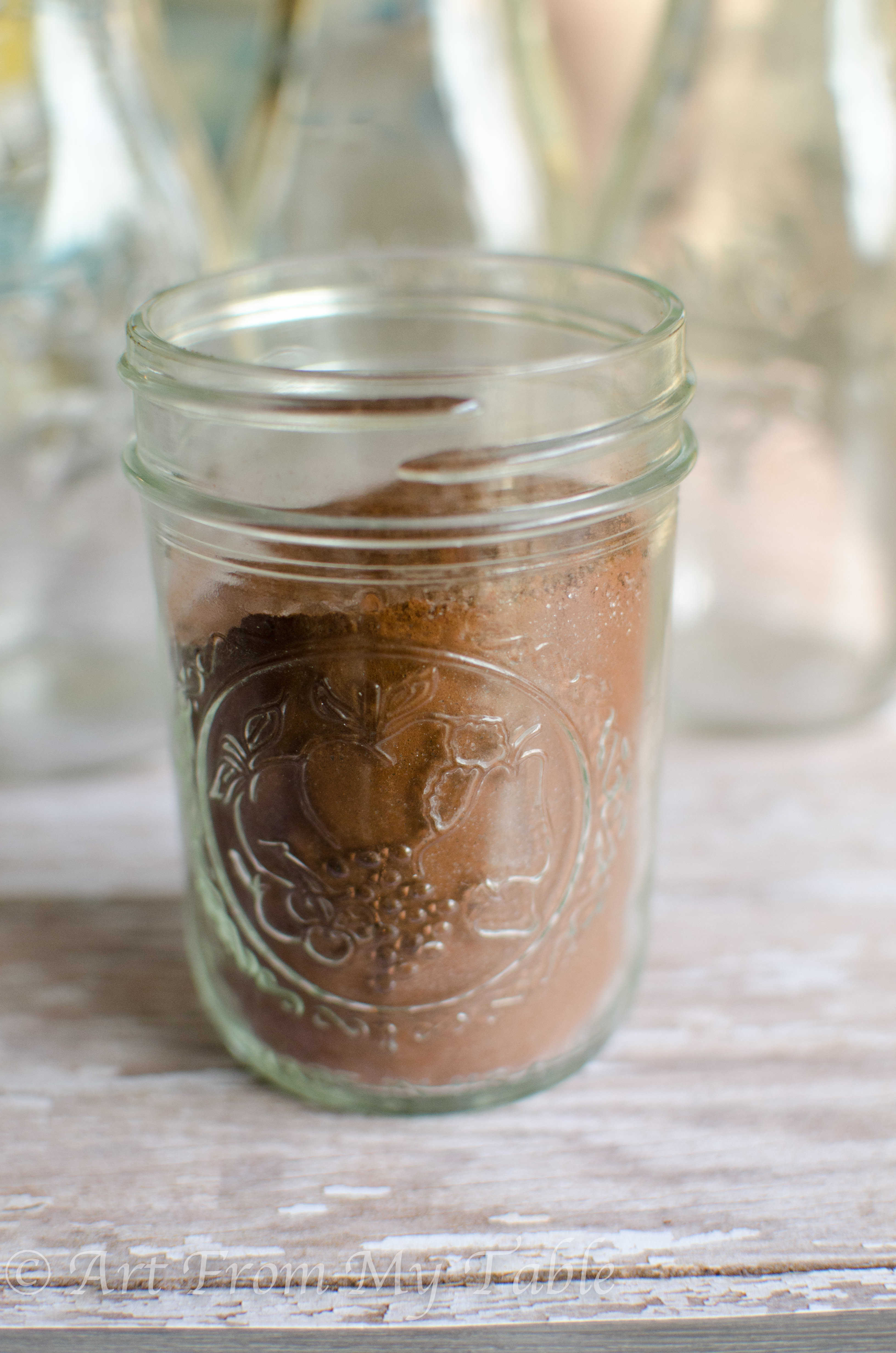 Jar with chocolate milk mix inside.