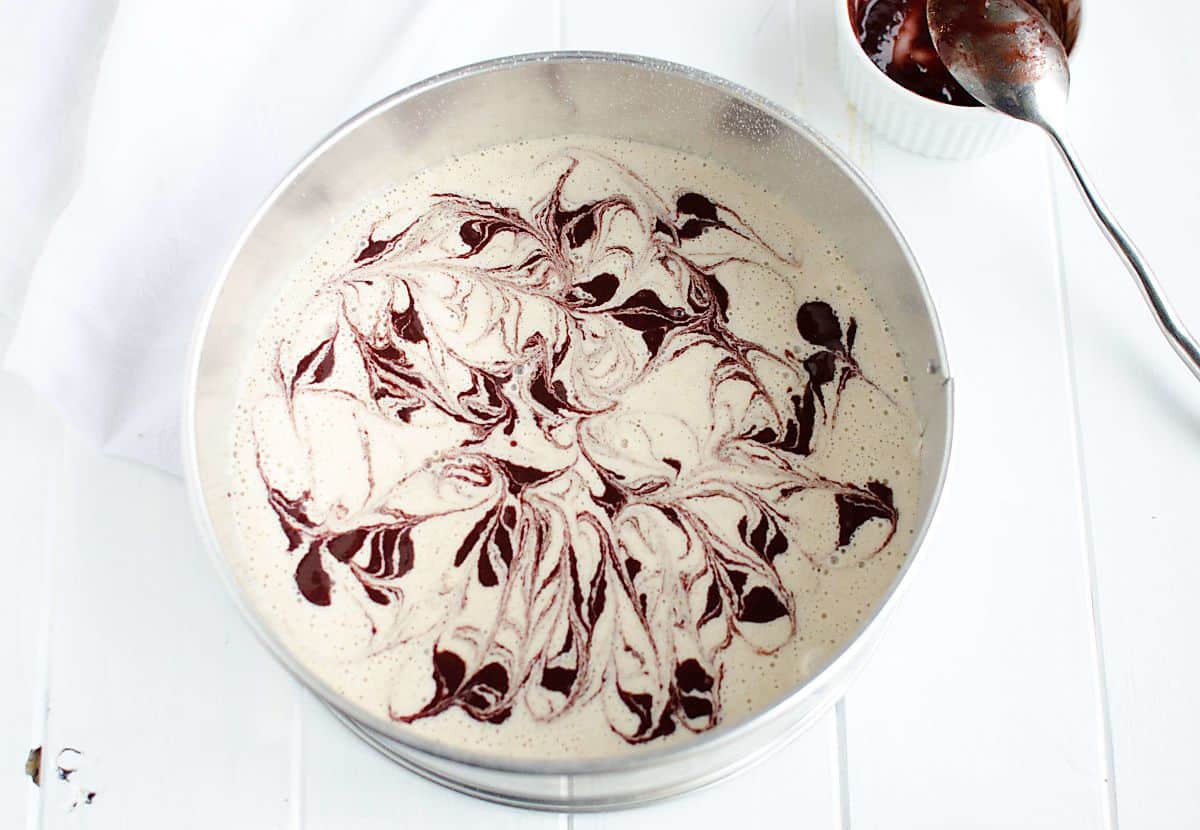 cake batter with cherry puree swirled throughout before baking.