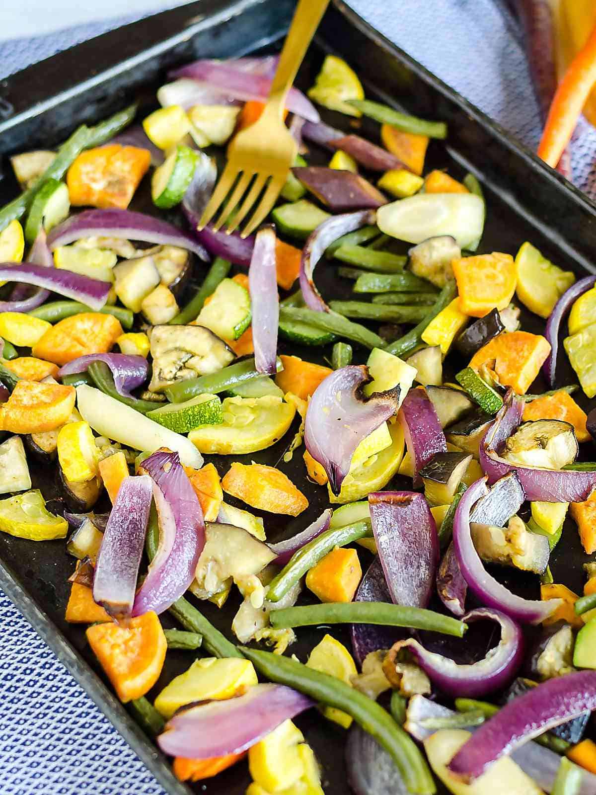 colorful easy roasted vegetables on a sheet pan 
