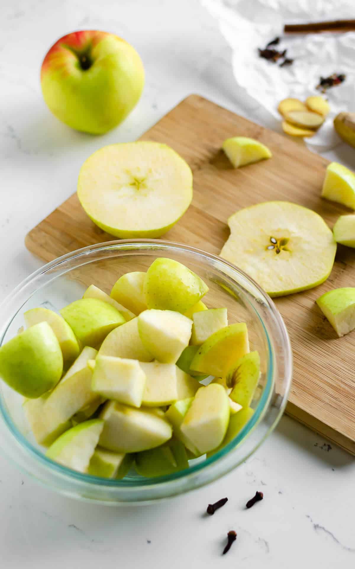 apples cut up into chunks in a large bowl