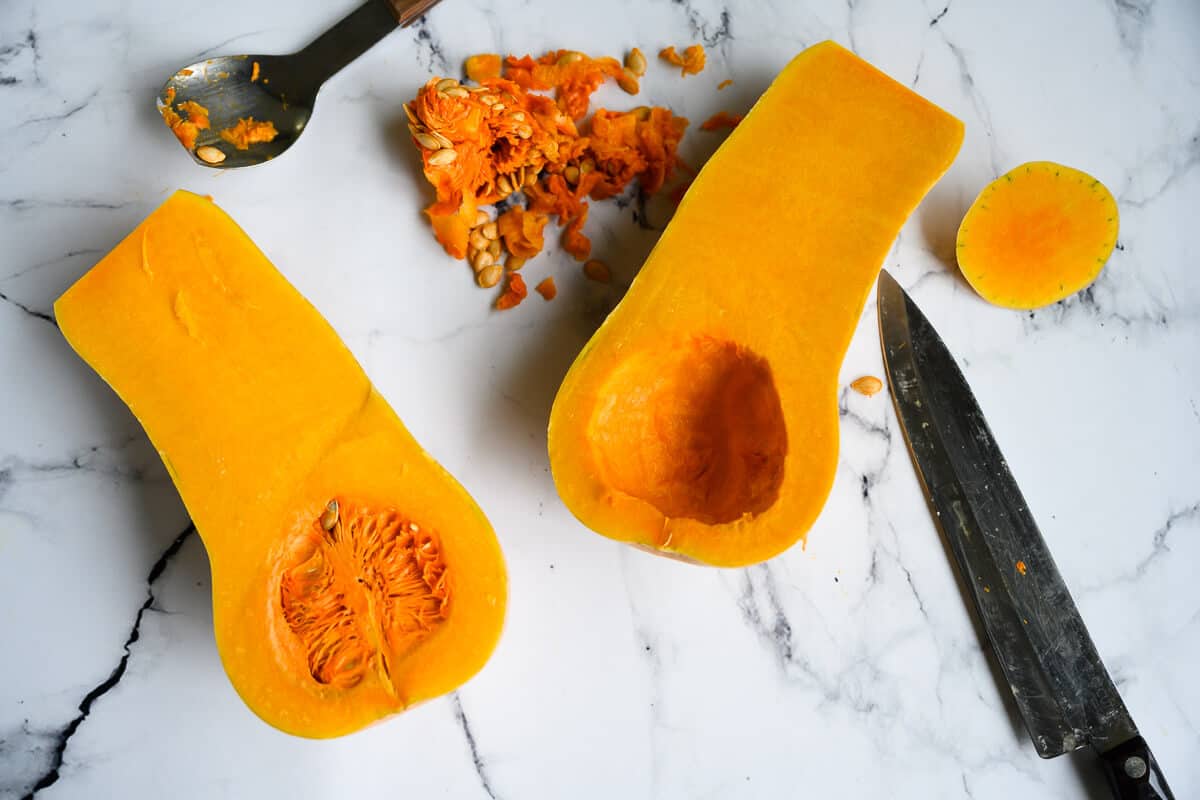 butternut squash cut in half lengthwise with seeds scooped out