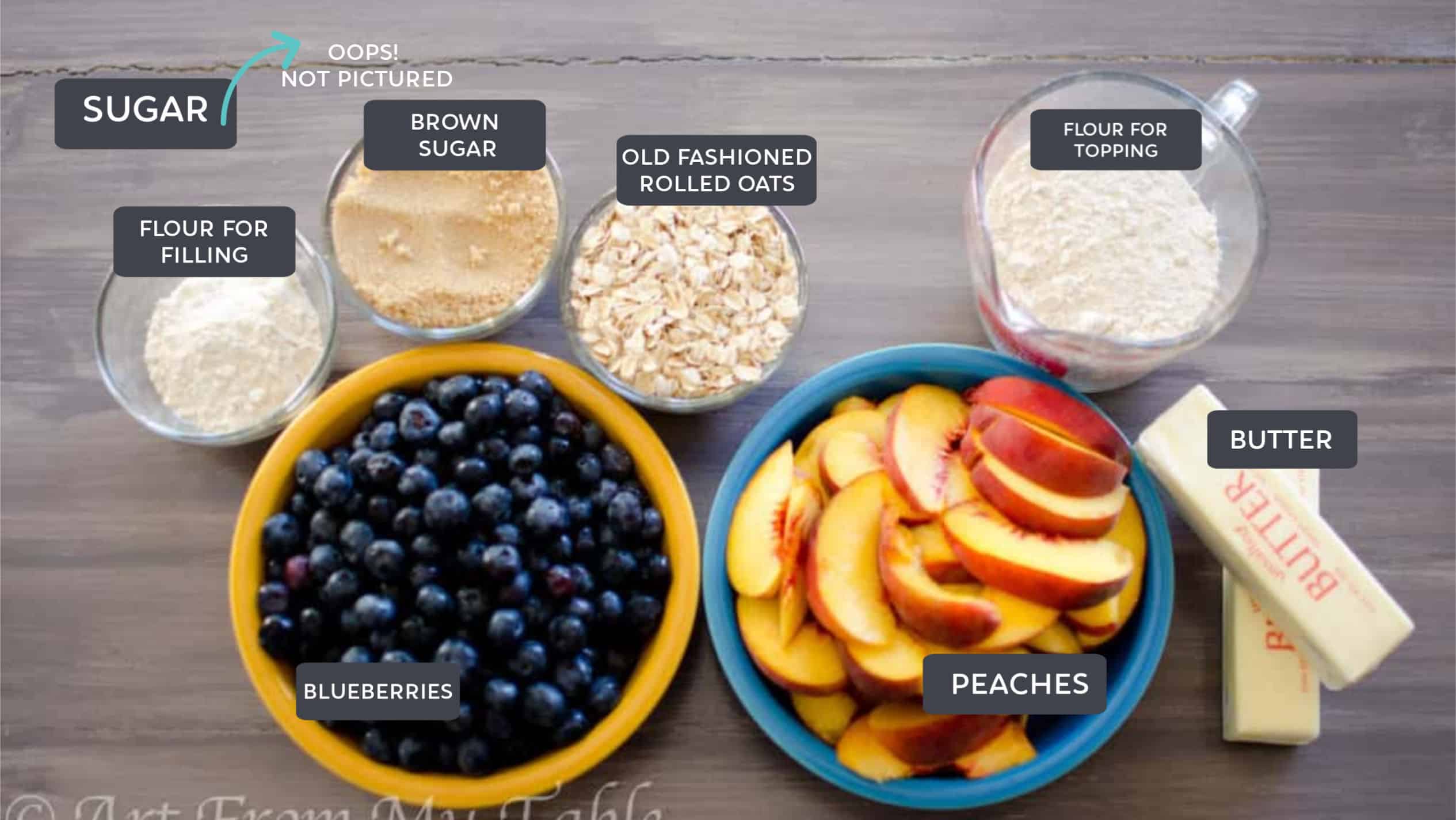 ingredients for blueberry peach crisp: blueberries, peaches, butter, flour, oats, brown sugar. 