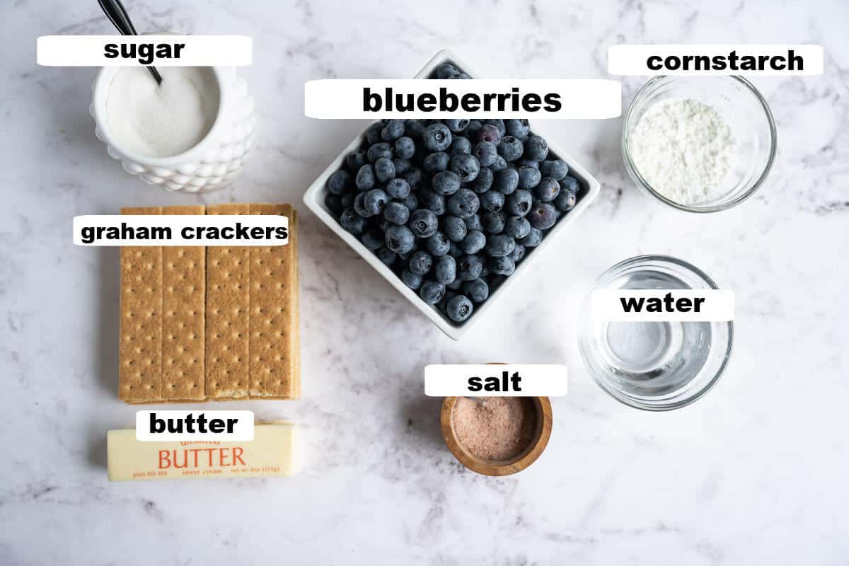 ingredients for blueberry pie: blueberries, sugar, cornstarch, water, salt, butter, graham crackers